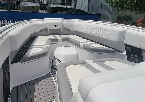 White seats with black trim are maintained by Marine Kings of Miami with boat maintenance services in Miami, Florida.
