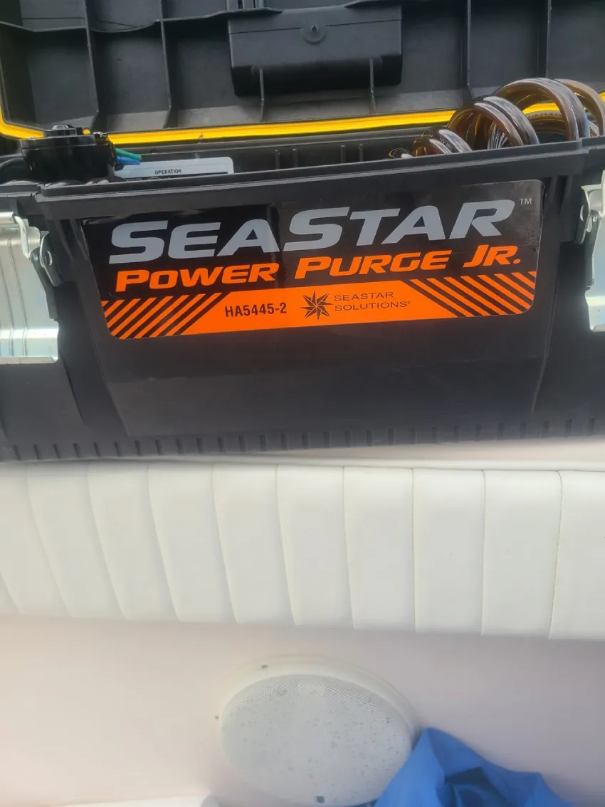  A white couch appears in a space supported by Marine Kings of Miami boat maintenance services.