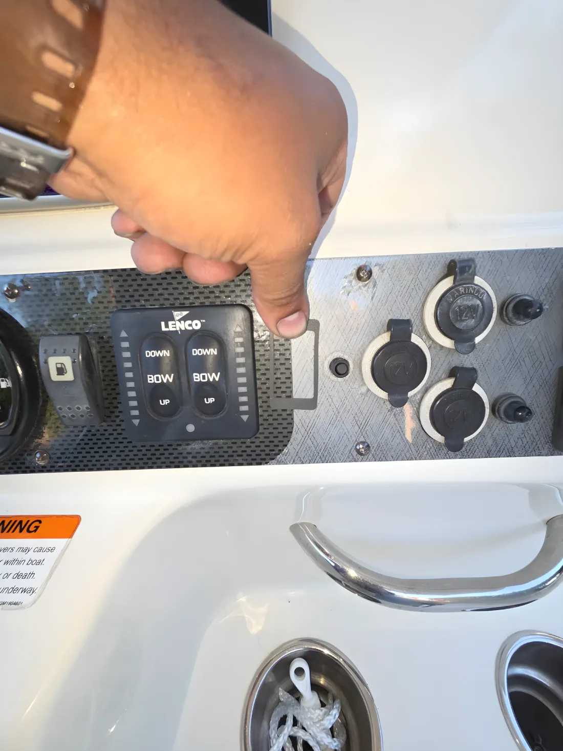  Boat controls are handled by Marine Kings of Miami during marine engine diagnostics.