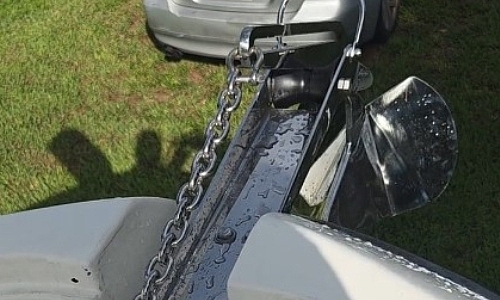  A car in the grass reflects mechanical work similar to boat repair Miami by Marine Kings of Miami.